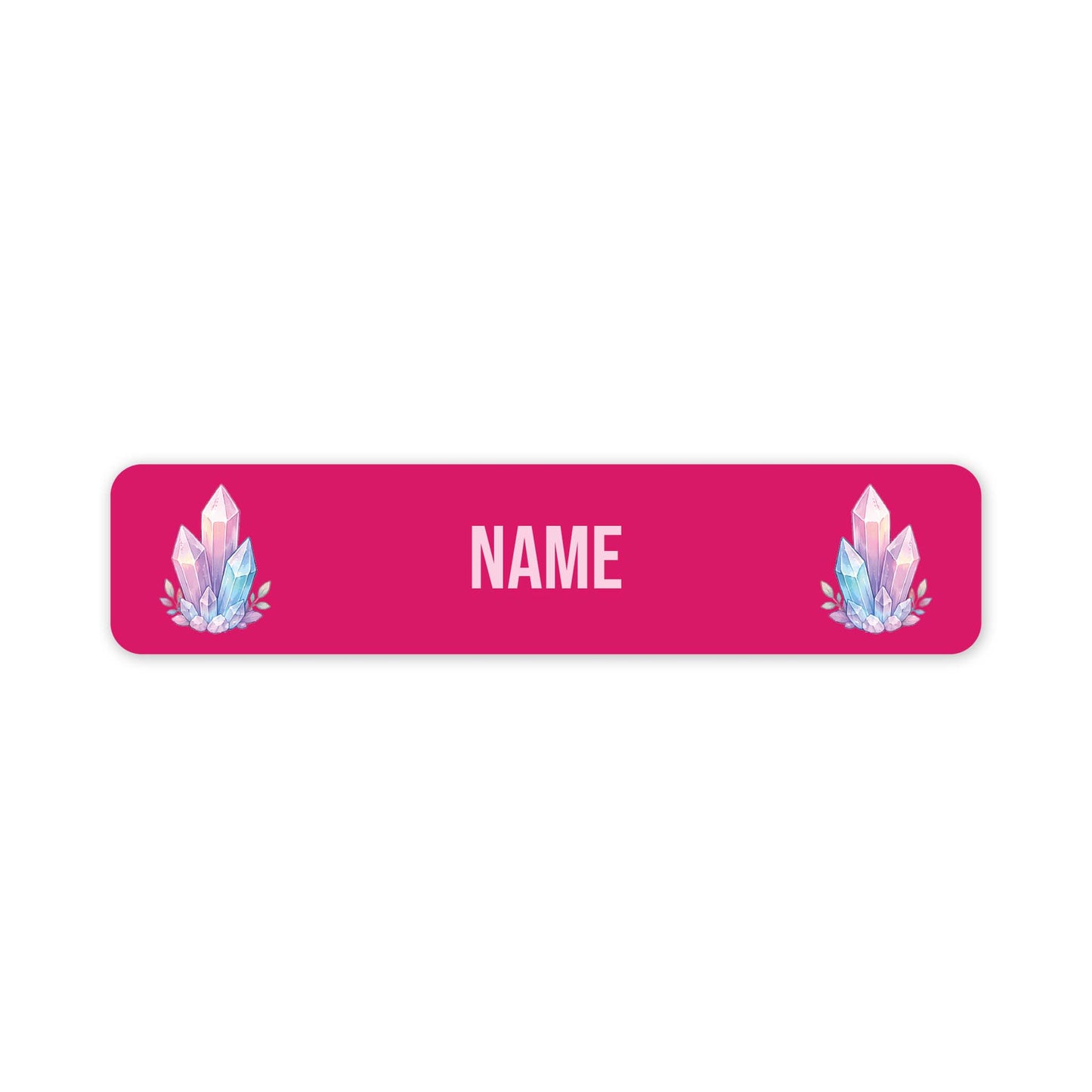 A horizontal rectangular name label with rounded corners, featuring a pink background, customisable 'NAME' in the centre, and two matching pastel crystal illustrations on the left and right sides.
