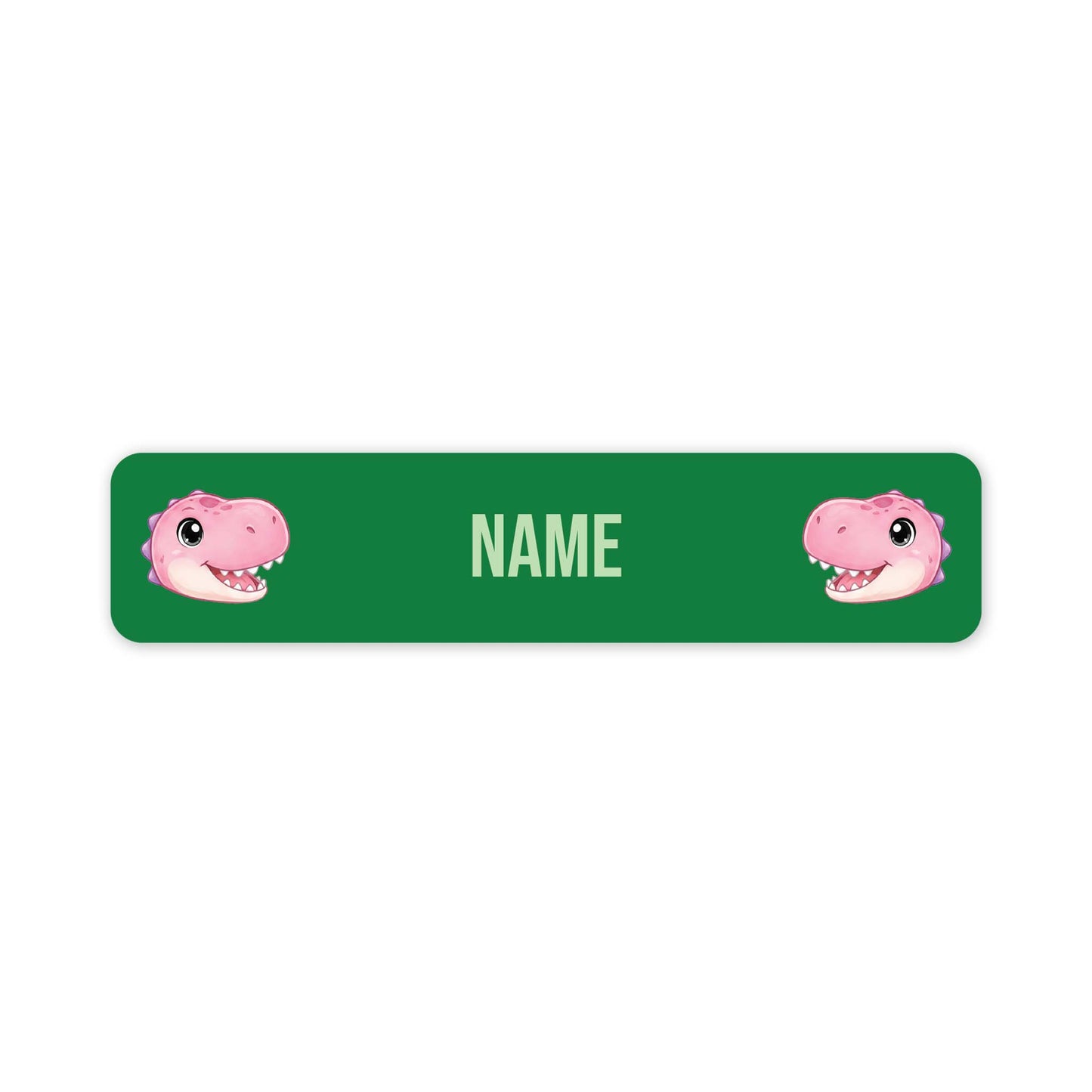 A green rectangular nameplate or sticker with rounded corners, featuring two pink cartoon dinosaur faces at the left and right edges and the word 'NAME' in the center for personalization.