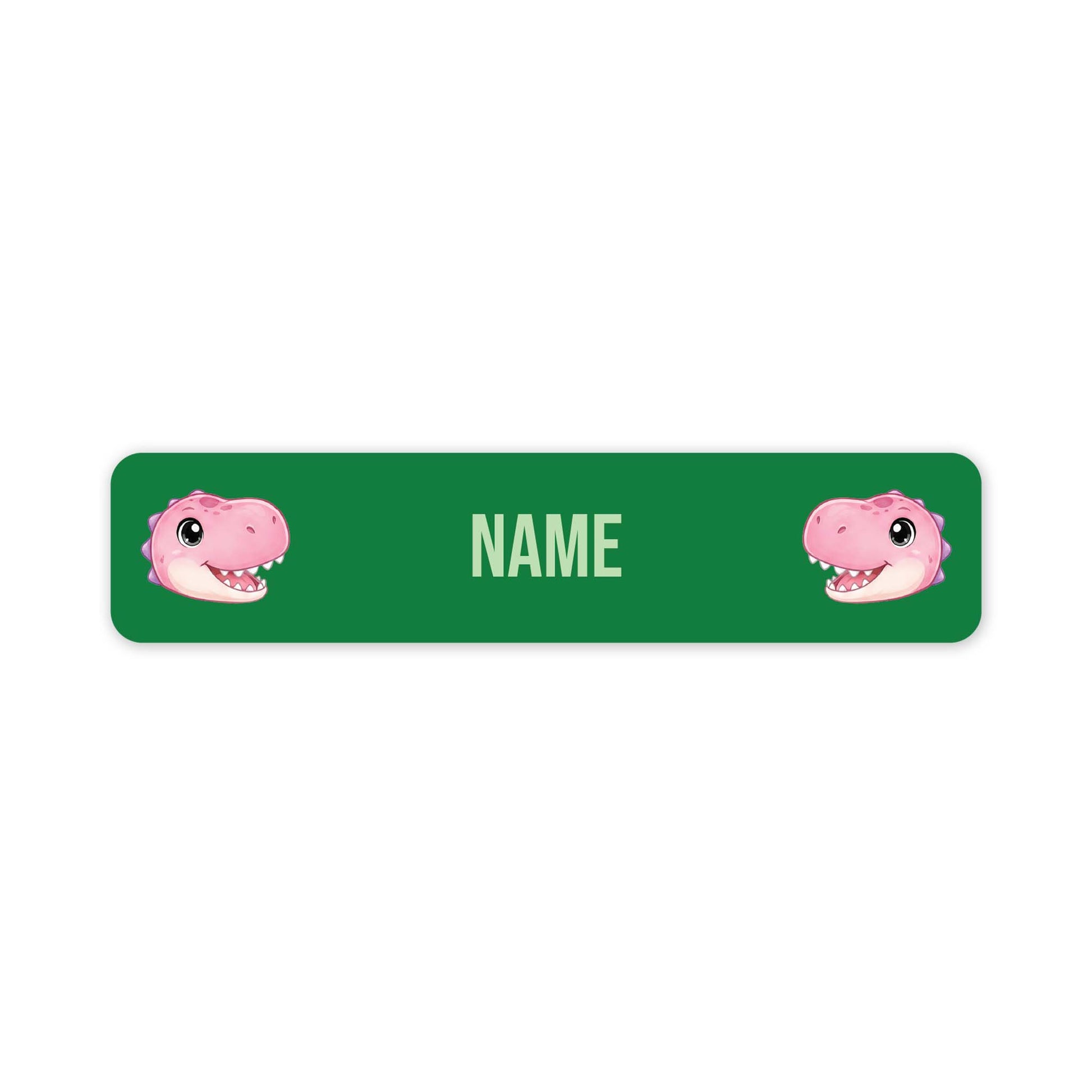 A green rectangular nameplate or sticker with rounded corners, featuring two pink cartoon dinosaur faces at the left and right edges and the word 'NAME' in the center for personalization.