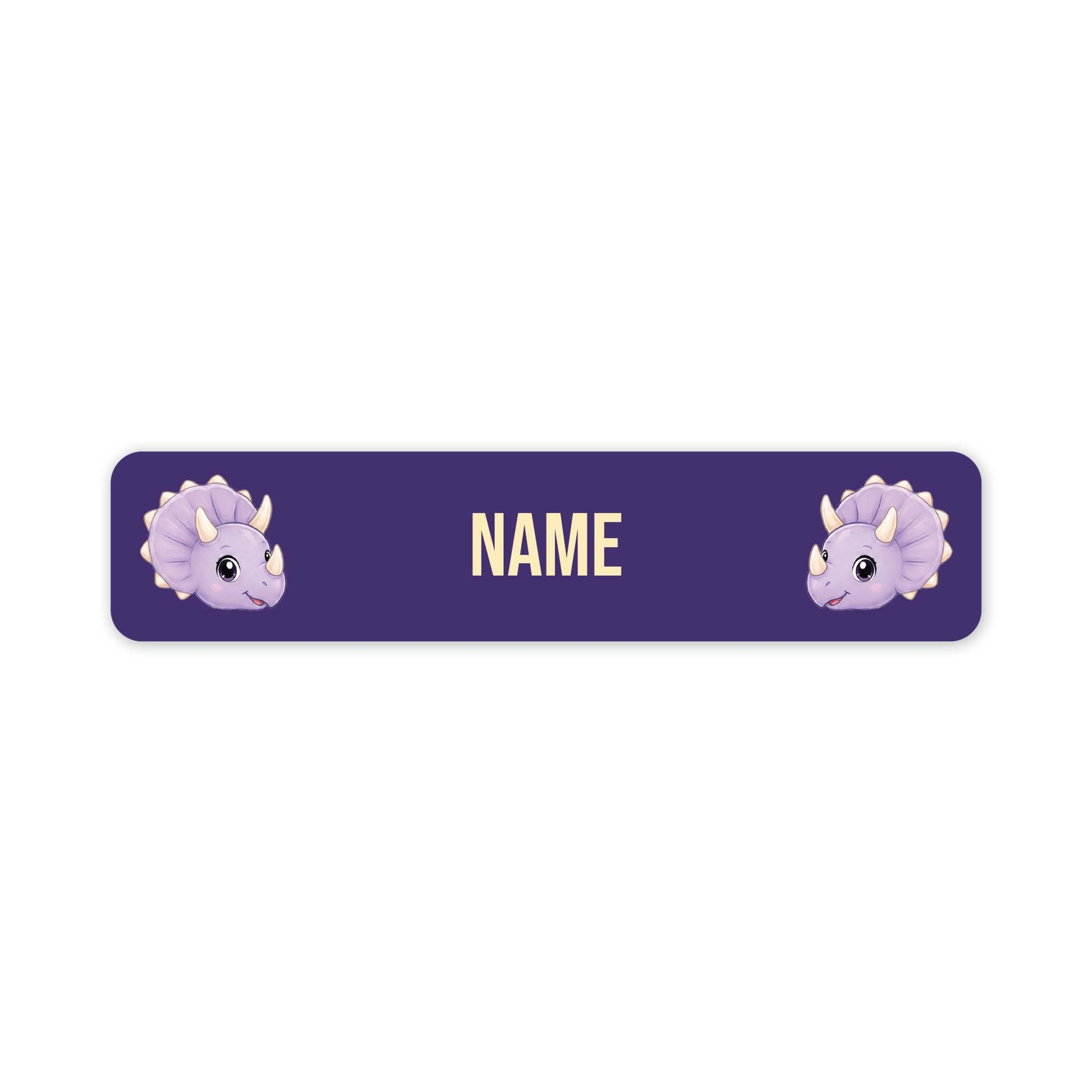 A horizontal purple personalized name label with rounded corners, featuring two cute light purple cartoon triceratops dinosaur faces on the left and right sides and the word 'NAME' in the center in a pale yellow font.