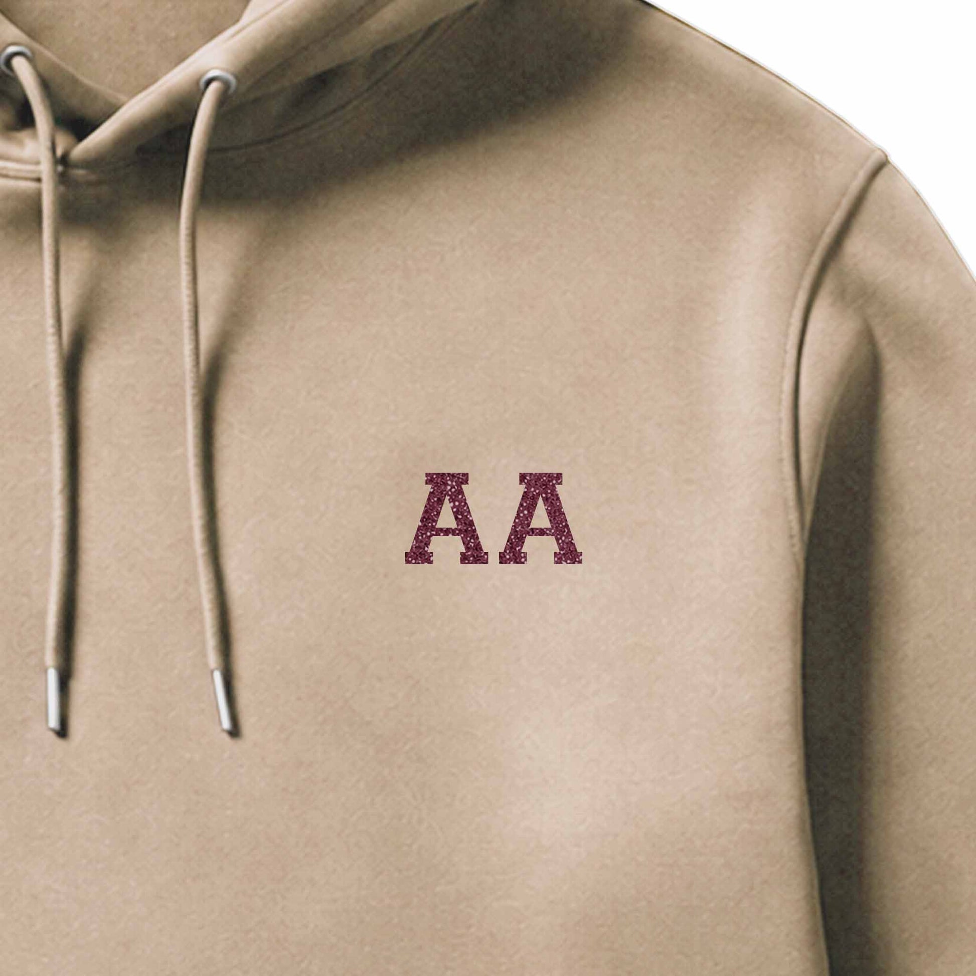 School leavers hoodie with custom iron-on "Initials" design in rose gold glitter on the front.