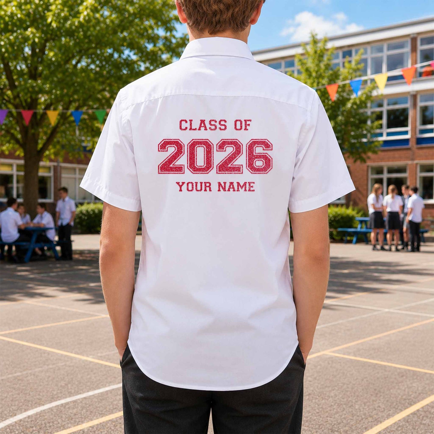 School leavers shirt with custom iron-on "Class of 2026" design in coral glitter on the back.