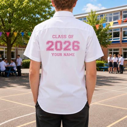 School leavers shirt with custom iron-on "Class of 2026" design in neon pink glitter on the back.