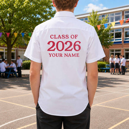 School leavers shirt with custom iron-on "Class of 2026" design in coral glitter on the back.