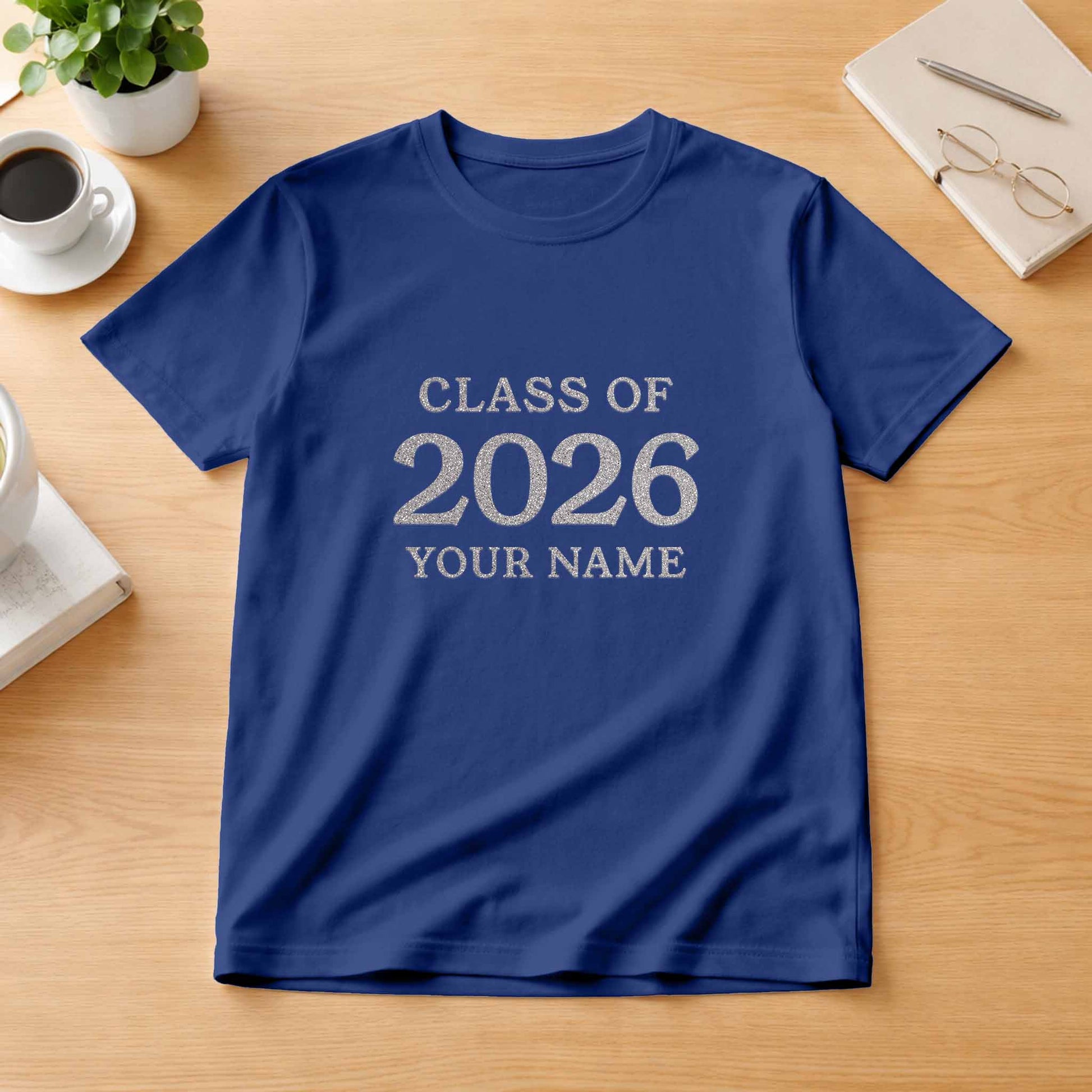 School leavers shirt with custom iron-on "Class of 2026" design in rainbow white glitter on the front.
