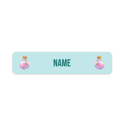 A personalised rectangular label with rounded corners, featuring a light blue background, the word 'NAME' in the centre and two cartoon potion bottles on the left and right sides.